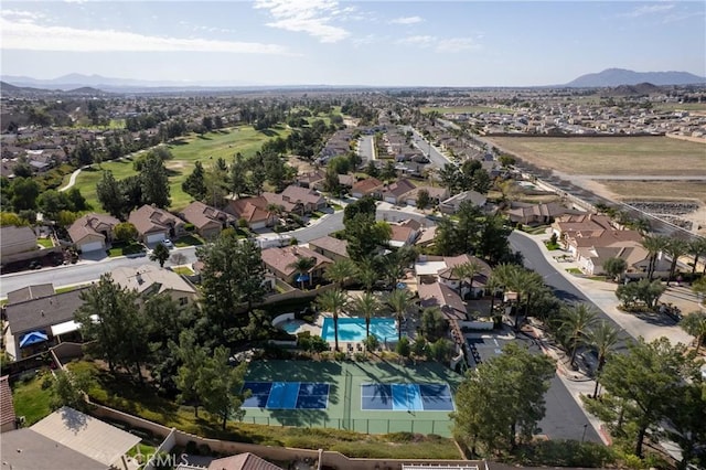 birds eye view of property featuring a mountain view and a residential view