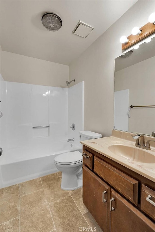 bathroom featuring toilet, vanity, shower / tub combination, and visible vents