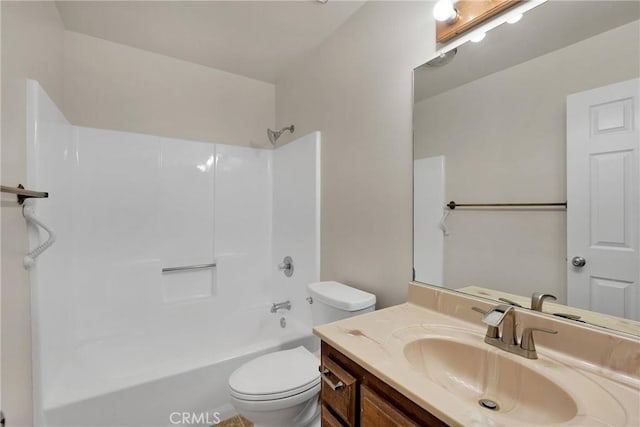 full bath with toilet, shower / bathing tub combination, and vanity