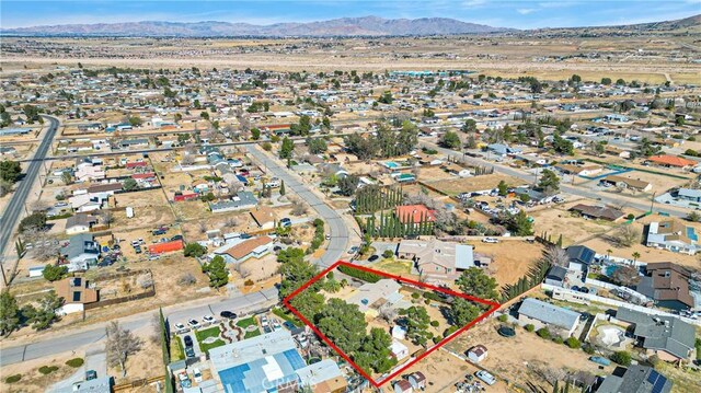 bird's eye view featuring a residential view and a mountain view