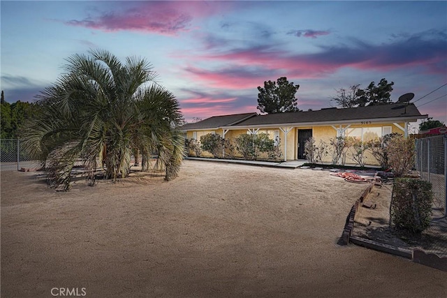 view of front of home with fence