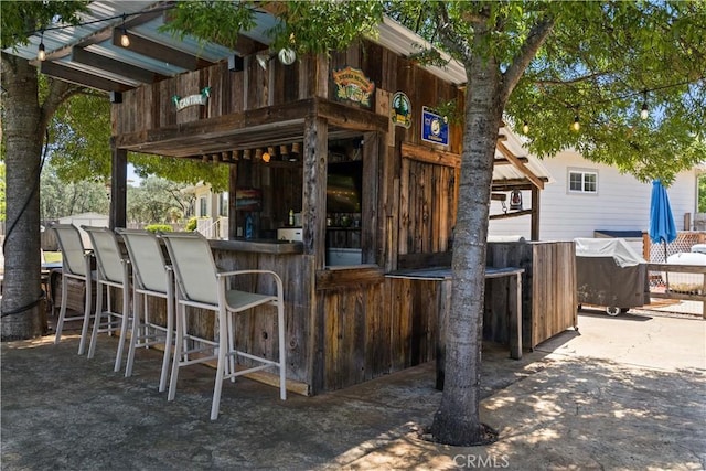 exterior space with outdoor dry bar