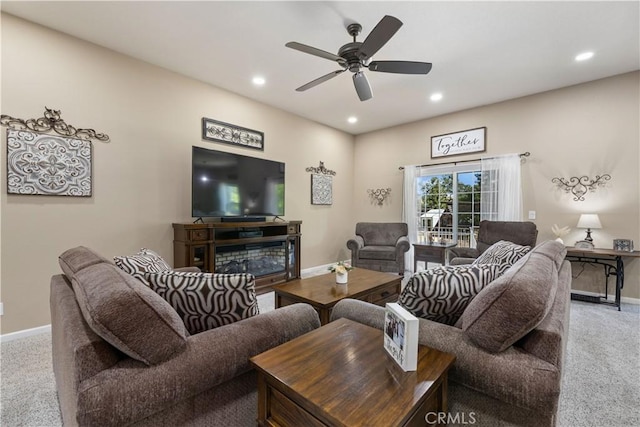 living room featuring recessed lighting, carpet flooring, and baseboards