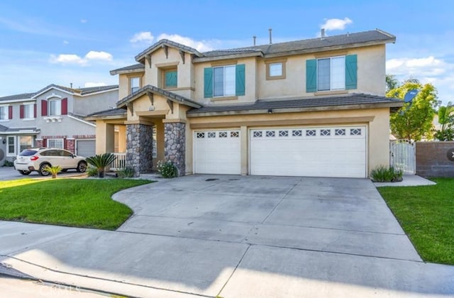 view of front of property featuring a garage, concrete driveway, a front lawn, and stucco siding