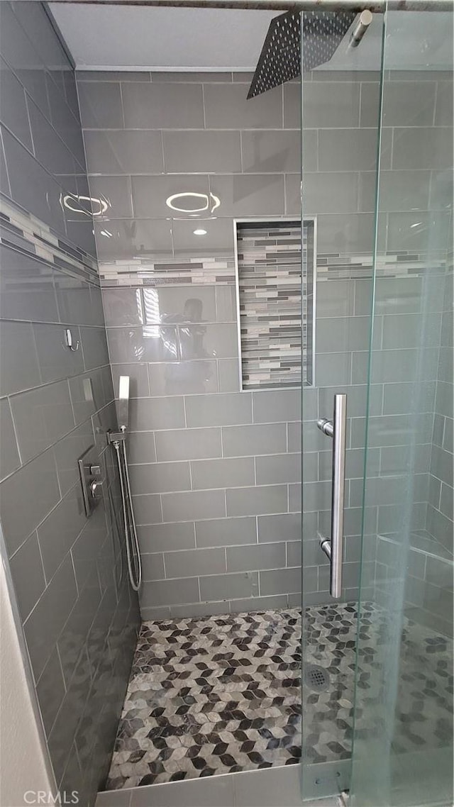 bathroom featuring a stall shower