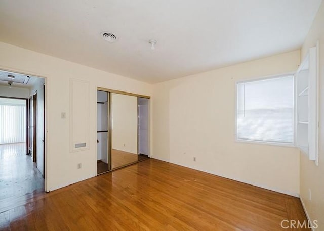 2116 Rancho Rd, El Sobrante, CA 94803 - unfurnished bedroom with wood finished floors and a closet