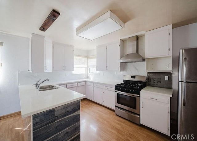 2116 Rancho Rd, El Sobrante, CA 94803 - kitchen with stainless steel appliances, wall chimney exhaust hood, light countertops, and white cabinetry