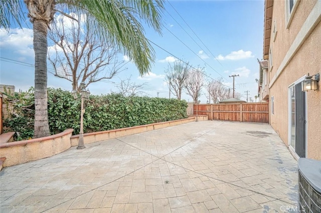 view of patio featuring a fenced backyard