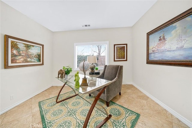 office space featuring visible vents and baseboards