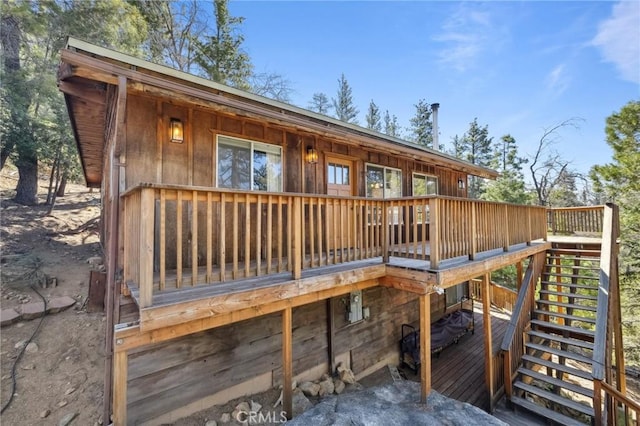 24950 Roble Dr, Idyllwild, CA 92549 - back of property with stairway and a wooden deck