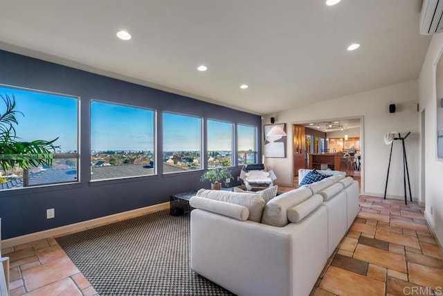 living room featuring baseboards, a wall mounted air conditioner, and recessed lighting