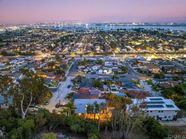 aerial view with a water view and a residential view