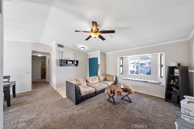 carpeted living area with visible vents, ornamental molding, vaulted ceiling, ceiling fan, and baseboards