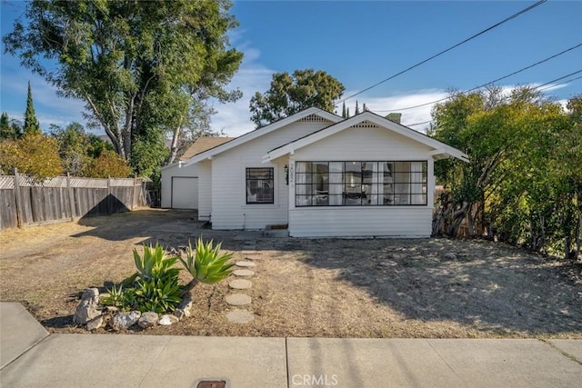 view of front of home with fence