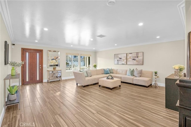 living area featuring recessed lighting, visible vents, baseboards, ornamental molding, and light wood finished floors