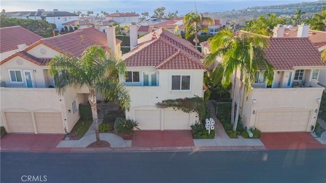 birds eye view of property with a residential view