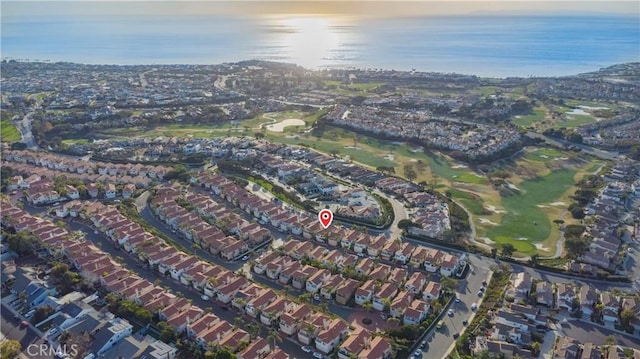 bird's eye view featuring a residential view and a water view