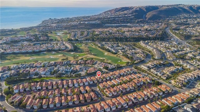 bird's eye view featuring a water view and a residential view