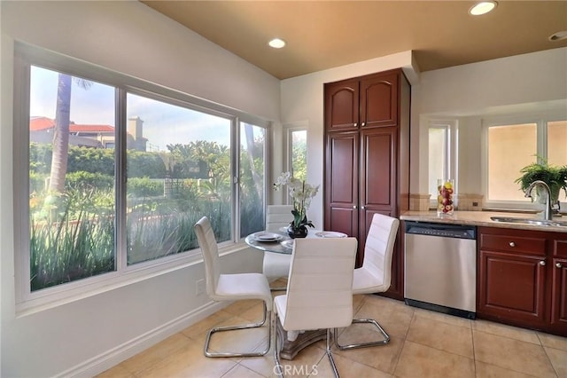 dining area featuring light tile patterned flooring, recessed lighting, and baseboards