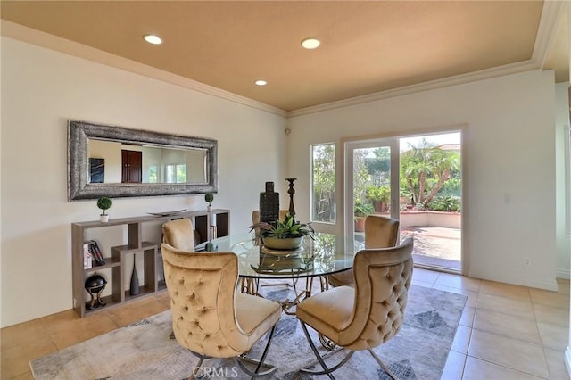 dining area featuring light tile patterned floors, ornamental molding, and recessed lighting