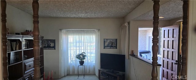 interior space featuring a textured ceiling