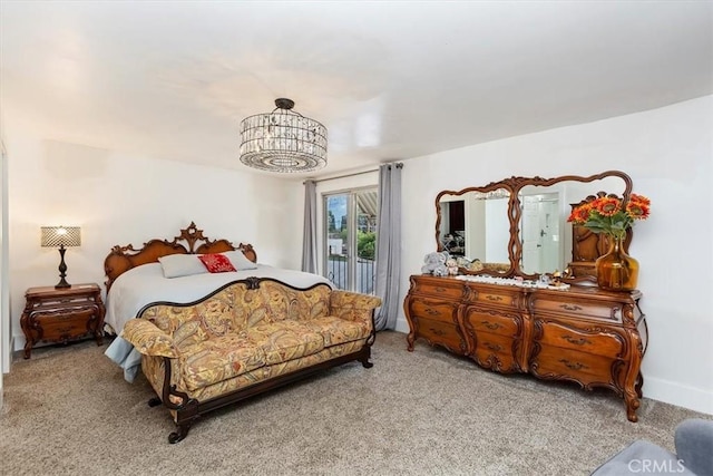 bedroom with carpet and baseboards