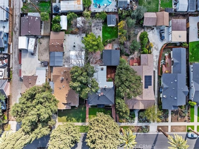 birds eye view of property with a residential view