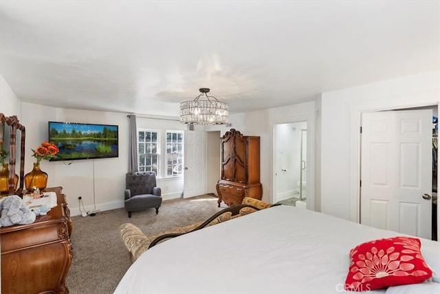 bedroom featuring a chandelier, carpet, connected bathroom, and baseboards