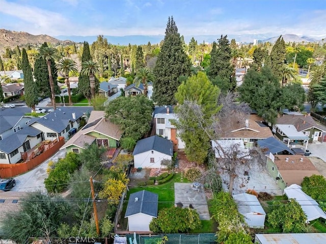 birds eye view of property with a residential view and a mountain view