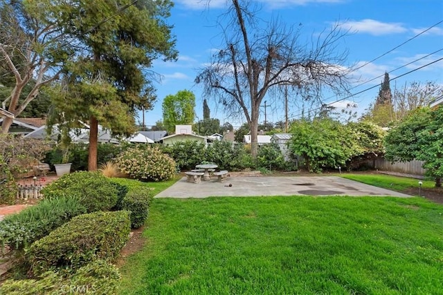 view of yard with a patio area and fence