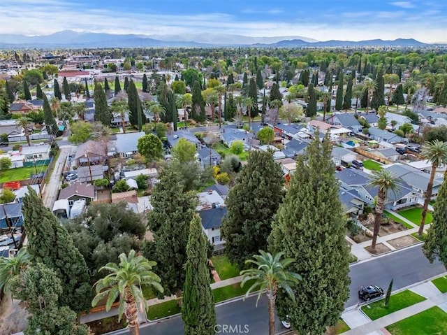 drone / aerial view with a residential view and a mountain view