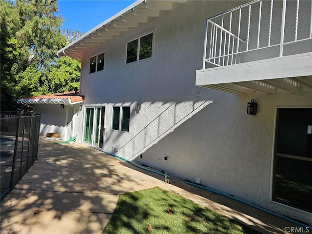 view of home's exterior featuring a patio area and stucco siding