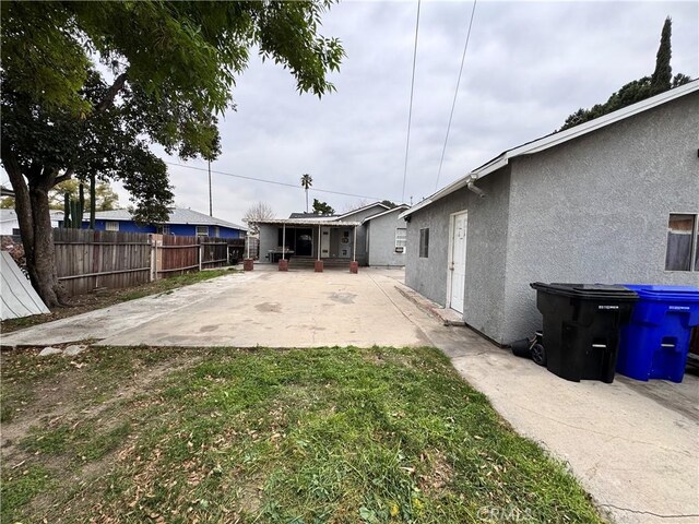 view of yard with a patio area and fence