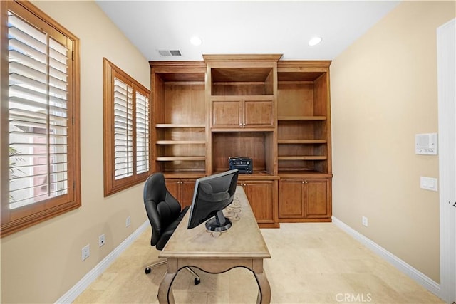 office with recessed lighting, visible vents, and baseboards