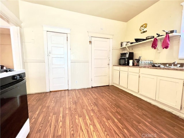 250 N Alvarado St Unit 3/4, Los Angeles, CA 90026 - kitchen with stove, light wood finished floors, and a wainscoted wall