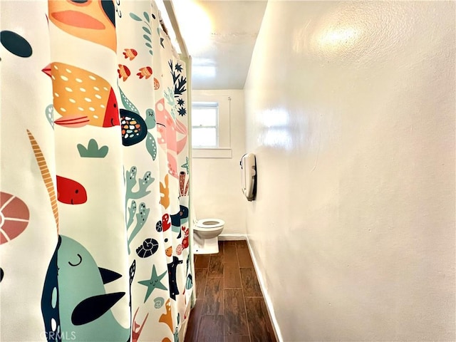 250 N Alvarado St Unit 3/4, Los Angeles, CA 90026 - full bath with wood tiled floors and a shower with shower curtain