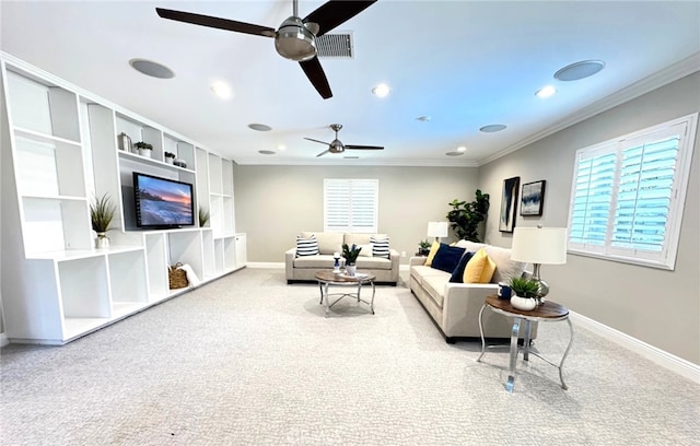 carpeted living area featuring recessed lighting, visible vents, crown molding, and baseboards