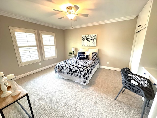 bedroom with baseboards, carpet floors, and crown molding