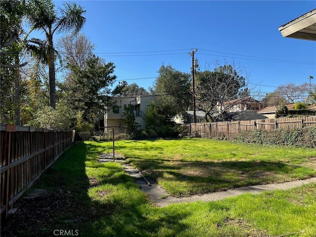 view of yard featuring a fenced backyard