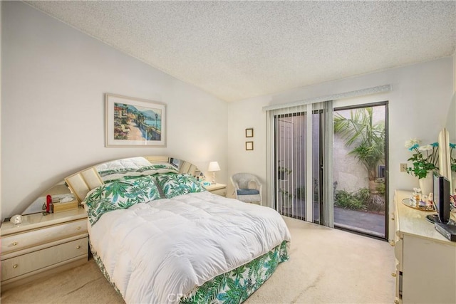 bedroom with access to outside, vaulted ceiling, a textured ceiling, and light colored carpet