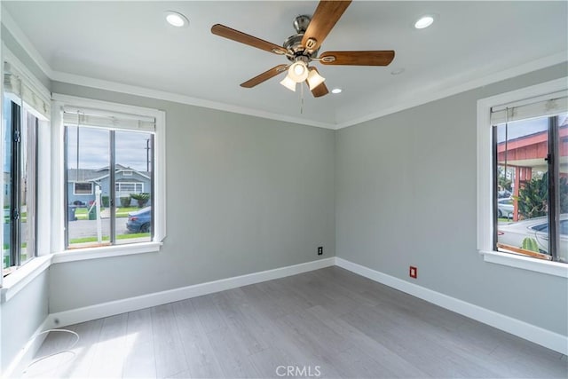 unfurnished room with baseboards, wood finished floors, ceiling fan, and recessed lighting