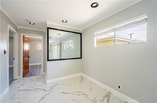 empty room featuring marble finish floor, baseboards, recessed lighting, and ornamental molding