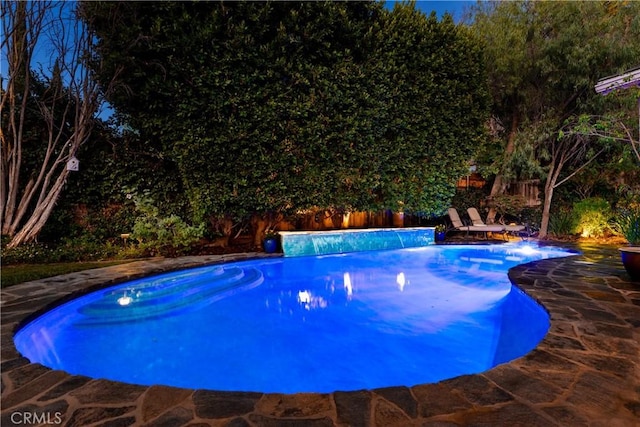 view of pool with a fenced backyard and a fenced in pool