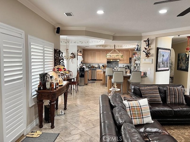 living room featuring light tile patterned floors, recessed lighting, visible vents, and crown molding