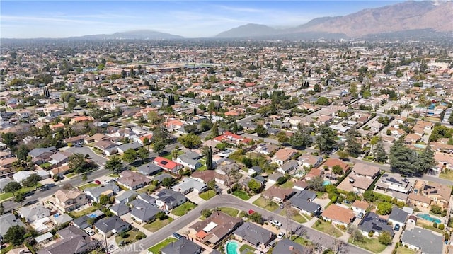 birds eye view of property featuring a residential view and a mountain view