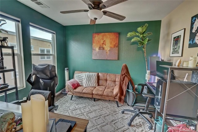 office with visible vents and a ceiling fan