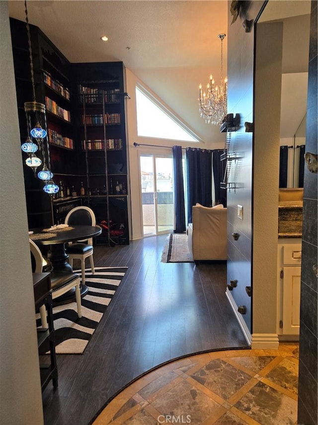 office space with an inviting chandelier, wood finished floors, and recessed lighting