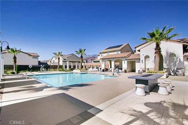 7082 Mallow Dr Unit 4, Fontana, CA 92336 - community pool with a patio area and a residential view