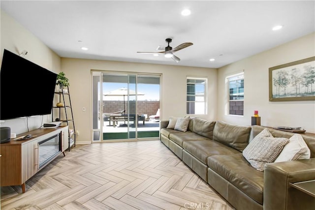 7082 Mallow Dr Unit 4, Fontana, CA 92336 - living room featuring a ceiling fan, baseboards, and recessed lighting