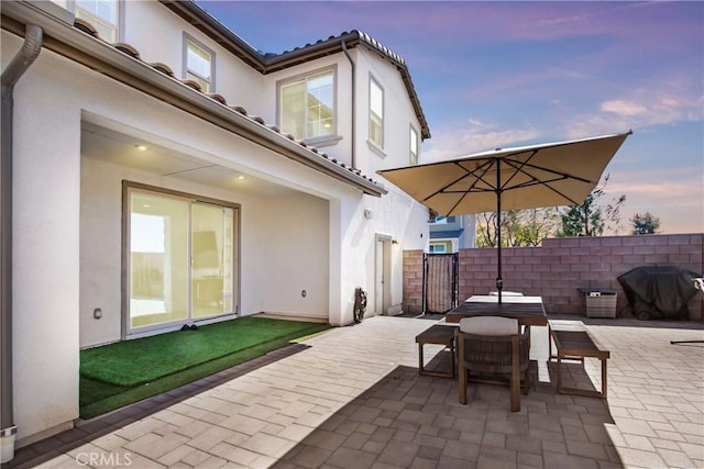 7082 Mallow Dr Unit 4, Fontana, CA 92336 - view of patio / terrace featuring fence, area for grilling, and outdoor dining area